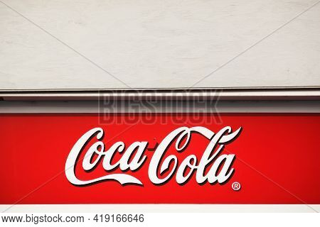Hou, Denmark - March 28, 2014: Coca-cola Logo On A Building. Coca-cola Is A Carbonated Soft Drink. I