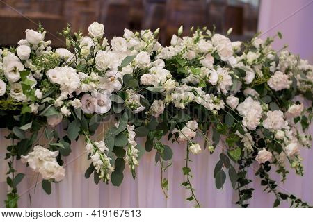 Main Table At A Wedding Reception With Beautiful Fresh Flowers