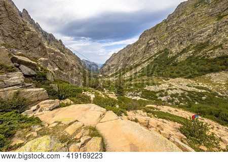View Over Dramatic Lush Restonica Gorge From Lake Melo Near Corte On The Island Of Corsica, France