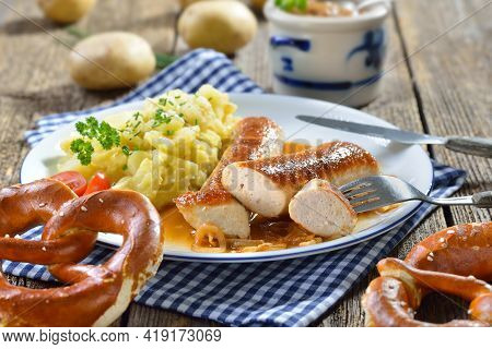 Fried Bavarian Sausages, So-called Wollwurst, A Specialty Similar To The German Veal Sausage But Wit