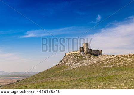 View Of The Enisala Fortress In Dobrogea, Romania. Amazing Landscape Of This Medieval Fortress Sitti
