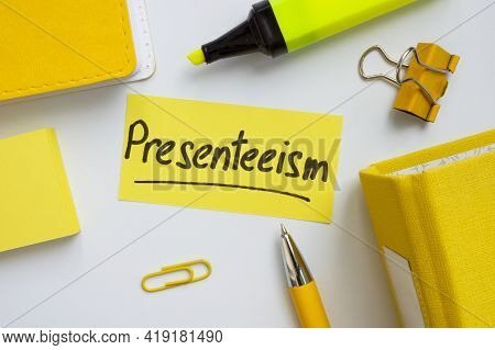 Presenteeism Term Written On The Piece Of Paper.