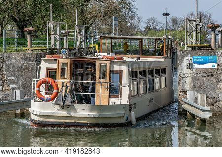 Straznice, Czech Republic - May 1, 2021, Lock Chambers On The Waterway Bata Canal. Passing Ship. Nat