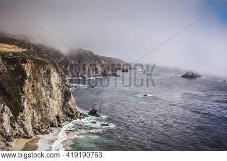 Panoramic Shot Of The Beautiful Big Sur Coast Of California On A Misty Day, United States Of America