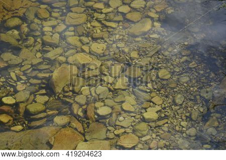 River. River Bottom With Crystalline Waters And Stones Of Various Sizes In The National Tourism Park