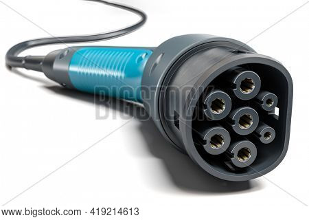 Electric car charger plug type 2 isolated on white background. 3d illustration