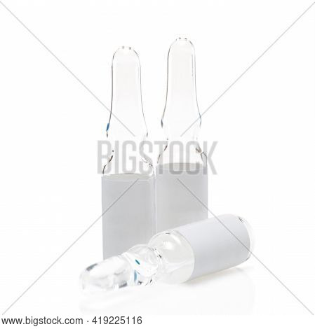 Glass Vials With Vaccine On White Background, Isolate