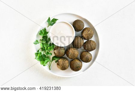 Falafel Balls. Deep Fried Balls From Ground Chickpeas. Traditional Middle Eastern Food. Light Backgr
