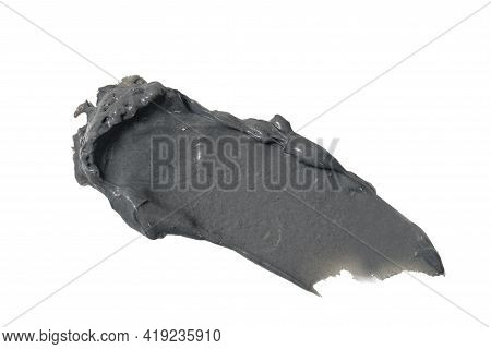 Smudge Of Mud Mask Clay With Minerals Of The Dead Sea Isolated On White Background. Texture. Selecti