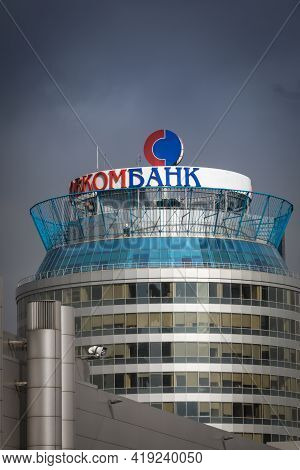 04.04.2021 Russia, Moscow. A Modern Glass Building With The Inscription Sovcombank On The Roof. Dark
