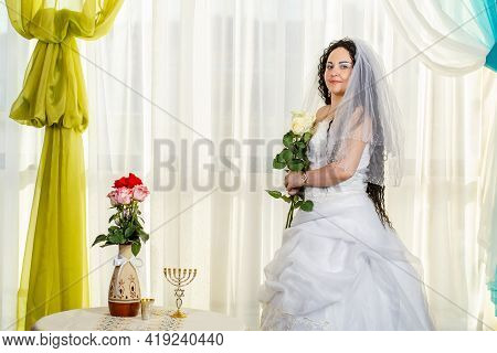 The Jewish Bride Is Waiting For The Groom Before The Chuppa Ceremony.