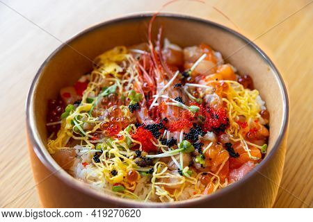 Bowl Of Japanese Sushi Rice Topped With Sashimi And Fish Roe Known As Kaisendon Donburi