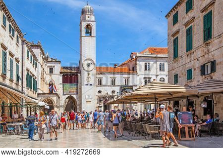 Dubrovnik, Croatia - Jine 12, 2017: Stradun street in the Old Town of Dubrovnik and walking tourists