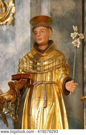 PLESIVICA, CROATIA - JULY 22, 2013: Saint Anthony statue on the Sacred Heart of Jesus altar in the parish church of Saint George in Plesivica, Croatia
