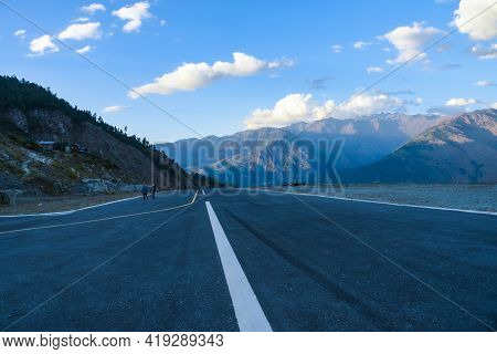 Mountain And Airport Runway, Low Angle Runway View