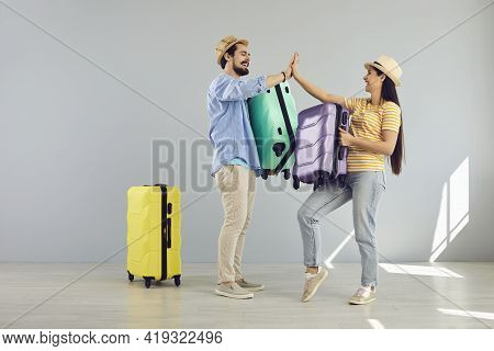 Giving High Five Tourists Couple Or Friends Giving High Five Full Body Portrait