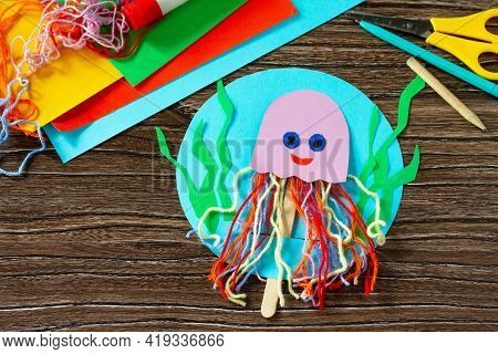 Summer Puppet Stics Toy Octopus On A Wooden Table. Handmade. Childrens Creativity Project, Crafts Fo