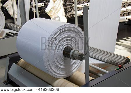 The Resulting Polypropylene Sleeve For The Manufacture Of Bags Is Wound On Large Reels. Drum For Win