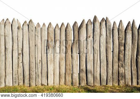 Wooden Fence From Logs Isolated On White Background. Fence From A Stockade Fence On White.