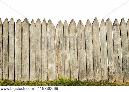 Wooden Fence From Logs Isolated On White Background. Fence From A Stockade Fence On White.