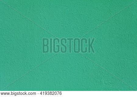 Green Wall, Texture, Background. The Building Wall, Painted With Water-based Paint. Smooth (flat) Su