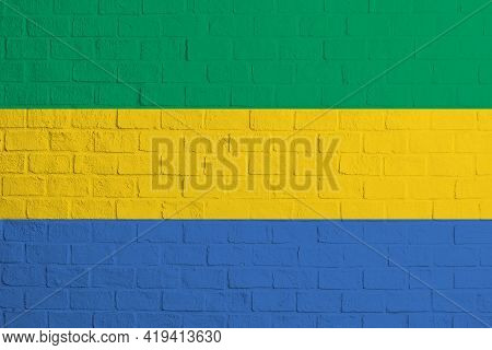 Flag Of Gabon. Brick Wall Texture Of The Flag Of Gabon.