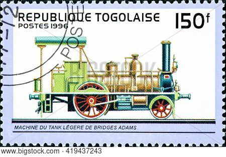 Togo - Circa 1996: A Stamp Printed In Togo Shows An Old Railroad Steam Engine Locomotive Train Made 