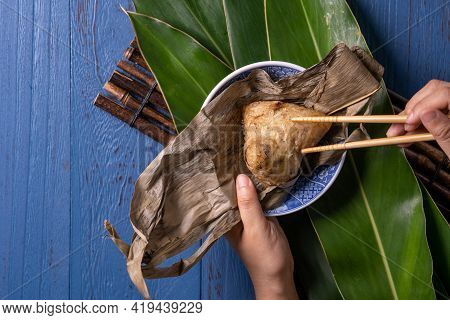 Zongzi Rice Dumpling Top View For Dragon Boat Festival Over Dark Black Background.