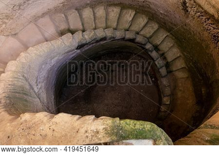 The Remains Of Stone Staircase Descends Into An Oil Press Tank On The Excavations Of The Ancient Mar