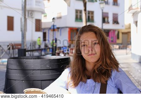 Portrait Of A Caucasian Woman Resting In A Cafe In The City Of Capileira Spain