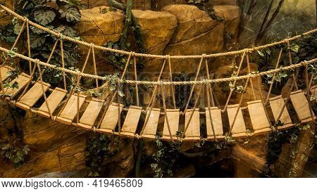 Suspension Bridge In The Jungle. Adventure Wooden Rope Suspension Bridge In Jungle Rainforest