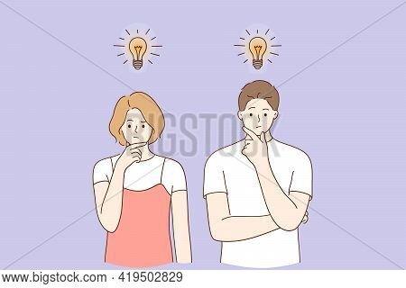 Innovation, New Ideas, Creativity Concept. Creative Man And Woman Standing Thinking With Light Bulbs