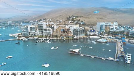 Aerial View Of The Bay, Marina And Buildings Of Ancon - Lima, Peru; Summer Area, The Beach And Some 