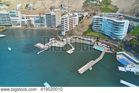 Aerial View Of The Bay, Marina And Buildings Of Ancon - Lima, Peru; Summer Area, The Beach And Some 