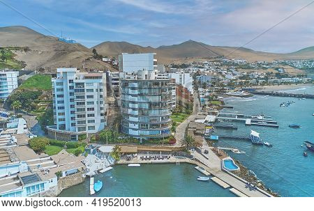 Aerial View Of The Bay, Marina And Buildings Of Ancon - Lima, Peru; Summer Area, The Beach And Some 