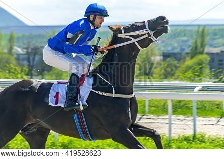 Pyatigorsk,russia - May 2,2021:before Horse Race - Jockey Boldirev On Brown Stallion Dzho River Of P