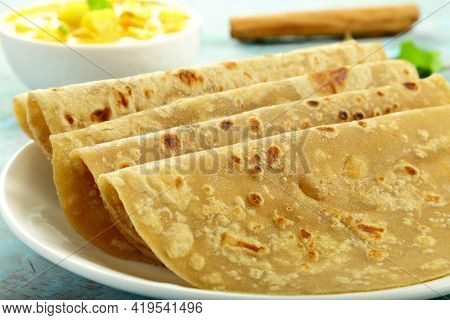 Homemade Fresh Whole Wheat Chapati Served With Curry,