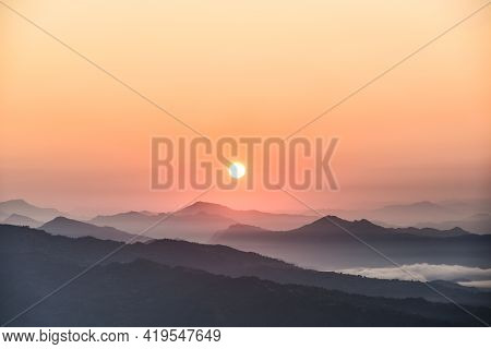 Beautiful Sunrise On The Mountain Tops Horizon
