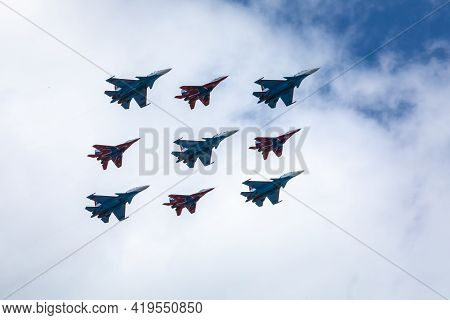 May 5, 2021, Russia, Moscow. A Group Of Modern Swifts And Russian Vityaz Planes Fly Over The City.