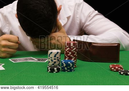 Devastated Gambler Man Losing A Lot Of Money Playing Poker In Casino, Gambling Addiction. Divorce, L