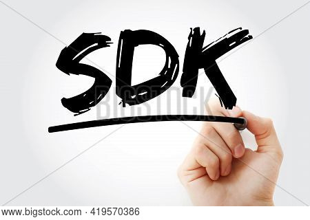 Sdk - Software Development Kit Acronym With Marker, Technology Concept Background