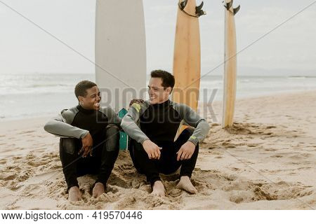 Happy surfers at the beach