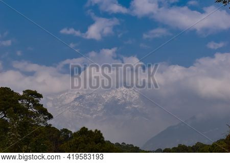 Picture Of Famous Dhauladhar Mountains Covered With Snow And Fog