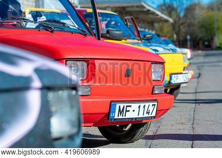 Riga, Latvia - May 01, 2021: Line Of Colorful Stylish Vintage Fiat 126 Pancars Rental Cars, Pancars 