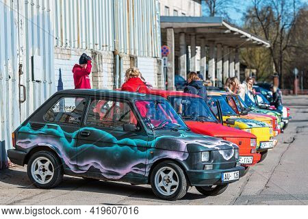 Riga, Latvia - May 01, 2021: Line Of Colorful Stylish Vintage Fiat 126 Pancars Rental Cars, Pancars 