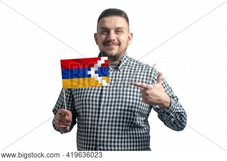 White Guy Holding A Flag Of Nagorno-karabakh Republic And Points The Finger Of The Other Hand At The