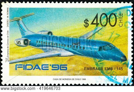 Chile - Circa 1996: Postage Stamp Printed In Chile Shows The Embraer Emb 145 Aircraft Belonging To T