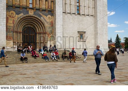 Moscow, Russia - 06 14 2016: Tourists On The Steps Of Assumption Cathedral In Moscow Kremlin. This R