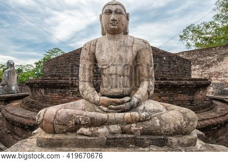 The Ancient Stone Buddha On The Upper Platform In The Vatadage, Ancient City Of Polonnaruwa. Polonna