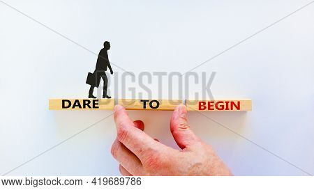 Dare To Begin Symbol. Wooden Blocks With Words 'dare To Begin'. Beautiful White Background, Business